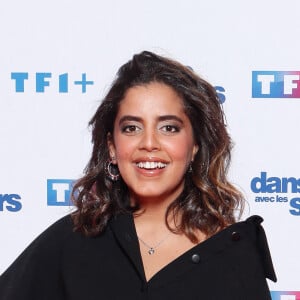 "Tu trouveras mes blessures et mes insultes, celles que j'avoue qu'à demi-mot, mes faux pas, mon p'tite salope, et de l'amour plus qu'il n'en faut", scandent en coeur les spectateurs.
Ines Reg - Photocall pour le lancement de la nouvelle saison de l'émission "Danse avec les stars 2024 (DALS)" à la Tour TF1 à Boulogne-Billancourt. Le 25 janvier 2024 © Christophe Clovis / Bestimage