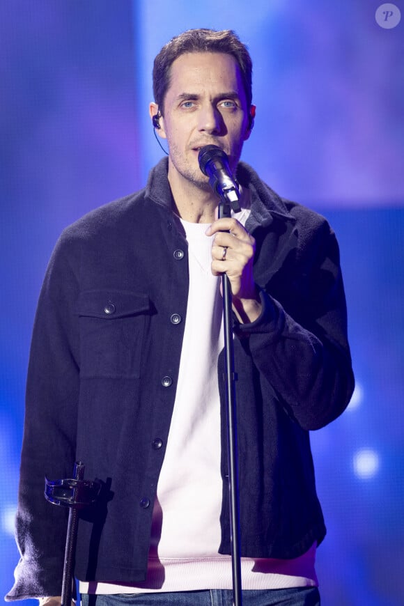 Exclusif - Grand Corps Malade (Fabien Marsaud) lors de l'enregistrement de la soirée "Les 30 ans du sidaction - la soirée événement" au Grand Rex à Paris diffusée le 23 mars 2024 sur France 2 À l'occasion du week-end du Sidaction, qui aura lieu les 22, 23, 24 mars prochain, et pour célébrer cette édition anniversaire, cette soirée-événement mettra l'espoir à l'honneur. L'émission reviendra sur le combat de la pop culture, qui a permis de faire bouger les lignes ces trente dernières années. Accompagnée d'un orchestre symphonique, Line Renaud, en fil rouge de la soirée, sera entourée des fidèles du Sidaction P.Obispo, C.Dechavanne, M.Robin, JP.Gaultier, V. et D.Burki. Ils seront les passeurs d'histoires de cette grande soirée. À leurs côtés, de nombreux artistes se succéderont sur scène. Des prestations uniques puisque chaque tableau a été conçu et chorégraphié spécialement pour l'occasion. © Cyril Moreau / Coadic Guirec / Bestimage