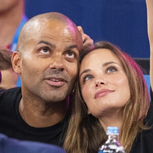 Tony Parker avec son fils Josh et sa compagne Agathe Teyssier - Célébrités assistent à la victoire de Teddy Riner sacré champion Olympique aux épreuves de judo +100KG lors des Jeux Olympiques de Paris 2024 (JO) au Arena Champs de Mars à Paris le 2 aout 2024. © Perusseau-Jacovides/Bestimage