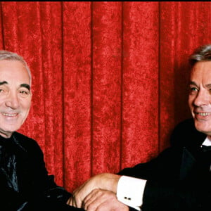 Charles Aznavour et Alain Delon (archive)