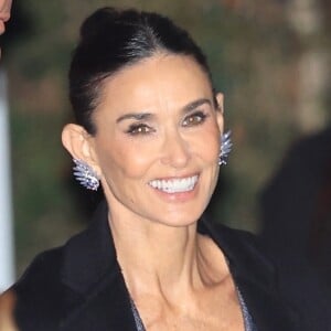 Los Angeles, CA - Demi Moore est tout sourire alors qu'elle quitte le quatrième gala annuel de l'Academy Museum au Academy Museum of Motion Pictures. Sur la photo : Demi Moore