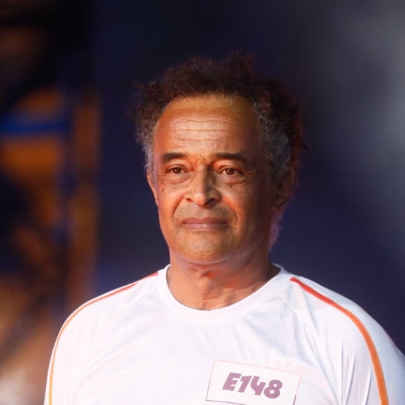 Yannick Noah embrase le chaudron olympique sur le plateau du "Concert de Paris" sur le parvis de l'hôtel de ville à Paris le 14 juillet 2024. Le concert était retransmis en direct sur France 2 et sur France Inter. © Christophe Clovis- Pierre Perusseau / Bestimage 