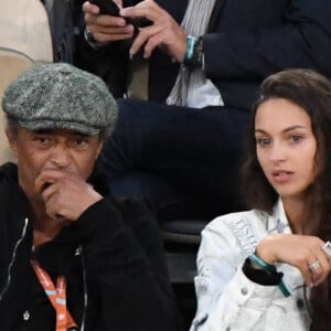 Yannick Noah et sa fille Jenaye Noah - Célébrités dans les tribunes des internationaux de France de Roland Garros à Paris le 30 mai 2022. 