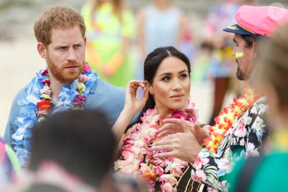 Le prince Harry, duc de Sussex, et Meghan Markle, duchesse de Sussex, enceinte, visitent la plage de Bondi Beach. Sydney, le 19 octobre 2018. 