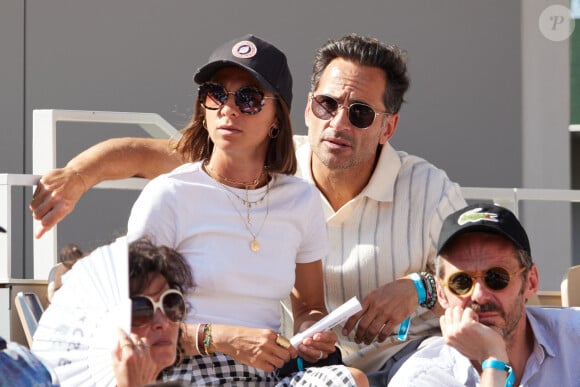 Théma - Les amoureux de Roland Garros - Florent Peyre et sa compagne Virginie Stref dans les tribunes lors des Internationaux de France de Tennis de Roland Garros 2023. Paris, le 29 mai 2023. © Jacovides / Moreau / Bestimage