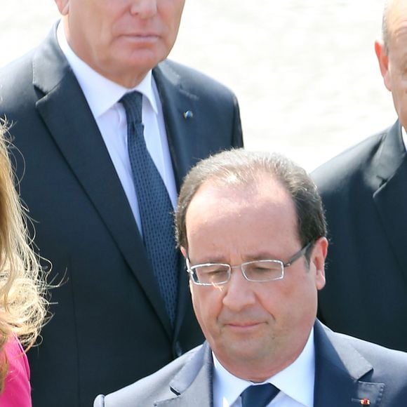 François Hollande et Valérie Trierweiler - Defile du 14 juillet 2013 a Paris.  Traditional military parade as part of the Bastille Day celebrations in Paris, France, 14 July 2013. The Bastille Day, the French National Day, is held annually on 14 July to commemorate the storming of the Bastille fortress in 1789. 