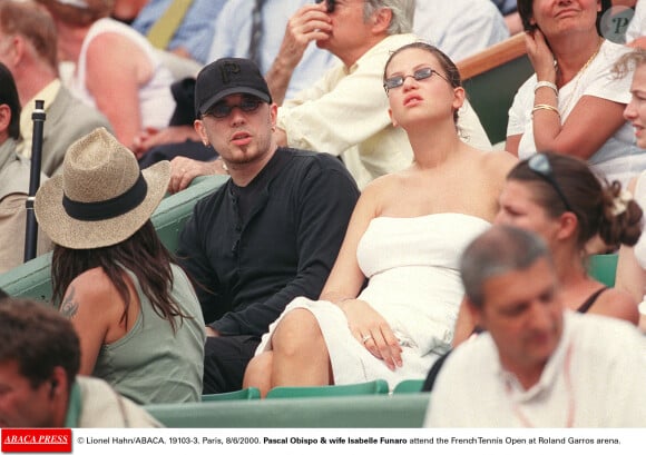 ...professionnels, mais aussi dans sa riche vie sentimentale.
© Lionel Hahn/ABACA. 19103-3. Paris, 8/6/2000. Pascal Obispo et son épouse Isabelle Funaro assistent aux Internationaux de France de Tennis à Roland Garros.