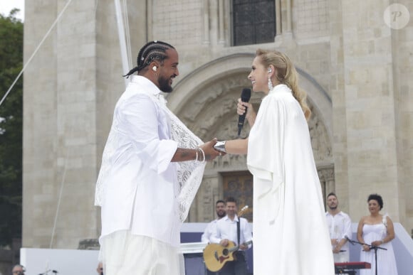 Slimane, Lara Fabian lors du dernier relais de La Flamme Olympiques avant la cérémonie d'ouverture des Jeux Olympiques (JO) de Paris 2024 à Saint-Denis, Seine Saint-Denis, France, le 26 juillet 2024. © Melloul-Tribeca/Bestimage 