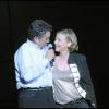 Dorothée accompagnée de Claude Berda (co-fondateur d'AB Productions), sur la scène de l'Olympia, le 17 avril 2010.