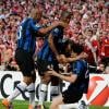 Pendant que Diego Milito, José Mourinho et les Interistes exultent, vainqueurs de la Ligue des Champions le 22 mai 2010, Franck Ribéry, qui avait eu un bon de sortie pour voir le match, fait grise mine...