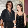 Vanessa Paradis et Johnny Depp lors de la première du film Pirates des Caraïbes à Paris, le 6 juillet 2006