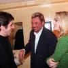 Patrick Fiori discute avec Johnny et Laeticia Hallyday en 1998