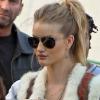 Rosie Huntington-Whiteley sur le tournage de Safe, dans le quartier de Chinatown, à New York, en octobre 2010.