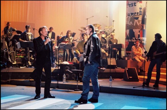 Johnny Hallyday et Eric Cantona, en 1998 pour le concert des Enfoirés.
