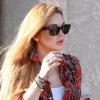 Lindsay Lohan sait très bien cacher sa mauvaise mine grâce à ses lunettes Ray-Ban.