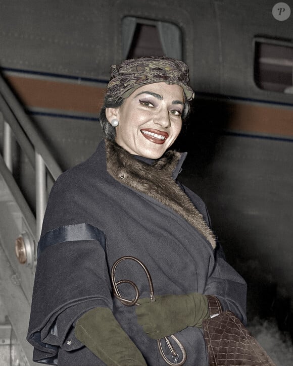 M3MNPA Diva, Maria Callas, opera singer, arriving at Chicago Midway Airport with her husband Giovanni Battista. January 12th, 1957. Original camera negative. Photo by Alamy/ABACAPRESS.COM 