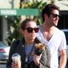 Miley Cyrus, son nouveau chéri Josh Bowman et son petit chien dans les rues de Los Angeles, le 8 février 2011