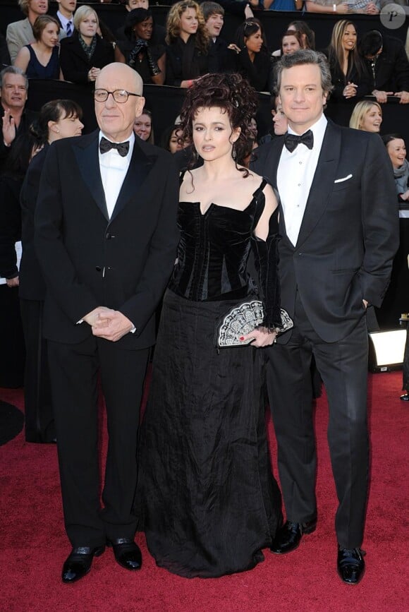 Geoffrey Rush, Helena Bonham Carter et Colin Firth lors de son arrivée à la 83e cérémonie des Oscars, au Kodak Theatre d'Hollywood, à Los Angeles, le 27 février 2011.