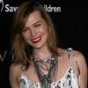 En janvier 2011, Milla Jovovich tout sourire pour la soirée Bulgari au profit de " Save the Children and artists for peace and justice".