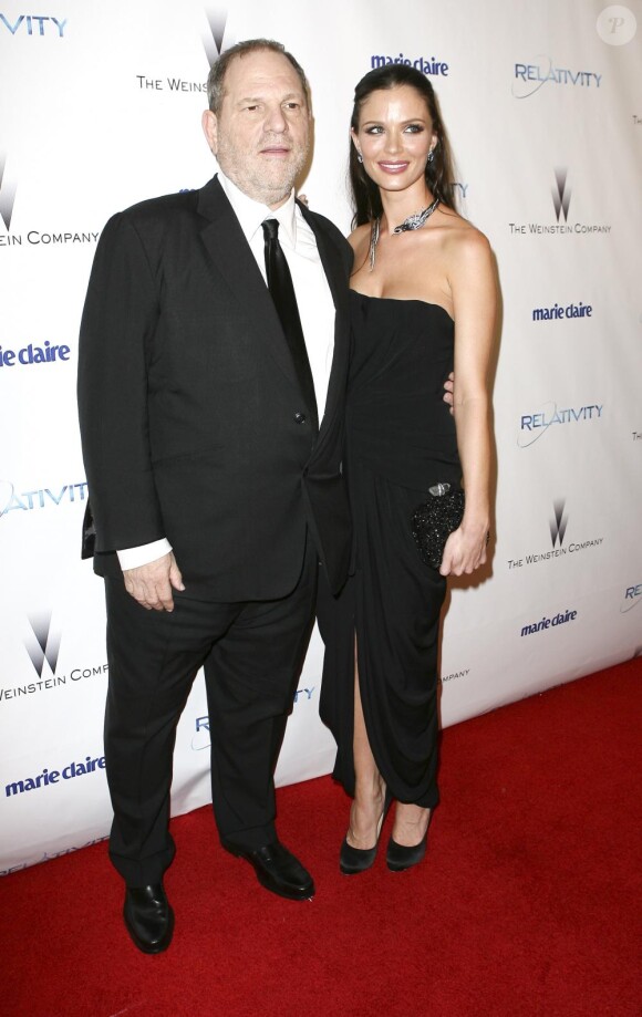 Georgina Chapman et son époux Harvey Weinstein, sur tapis rouge. Janvier 2011