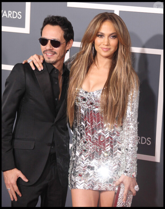 Jennifer Lopez et Marc Anthony, aux Grammy Awards le 13 février. La chanteuse latina chantera dans la chanson de Simon Cowell