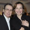 Dean Tavoularis et Carole Bouquet à la galerie parisienne Catherine Houard, lors de l'exposition "Magicien d'Hollywood, le cinéma dans la peinture, la peinture dans le cinéma". 17/03/2011