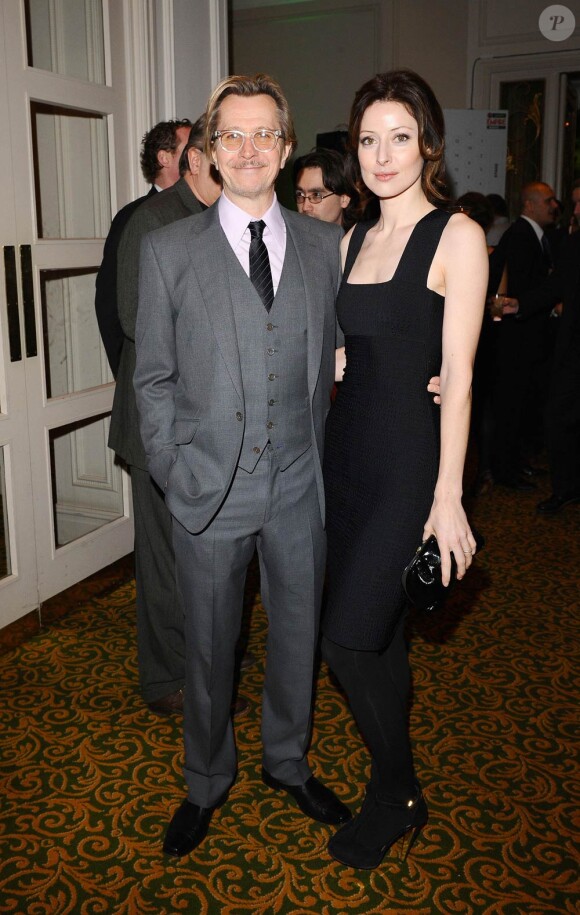 Gary Oldman et sa femme Alex Edenborough lors des Jameson Empire Film Awards, au Grosvenor House Hotel, à Londres, le 27 mars 2011.