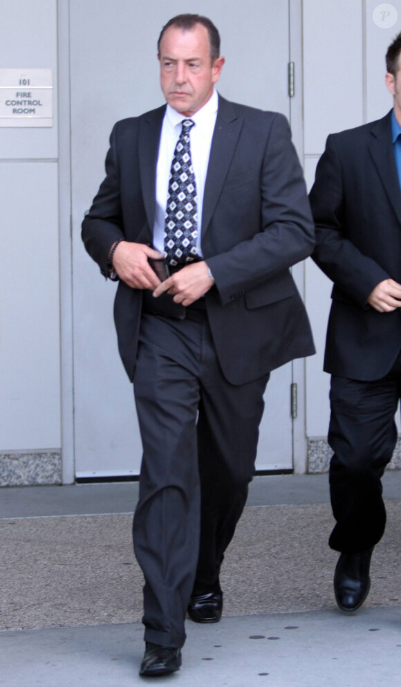 Le père de Lindsay Lohan, Michael, arrivant au tribunal à Los Angeles le 22 avril 2011