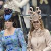 Robe Valentino et chapeau Philip Treacy pour Beatrice d'York, robe Vivienne Westwood pour Eugenie d'York. Londres, 29 avril 2011