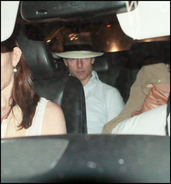 Tom Cruise a passé une délicieuse soirée avec les deux femmes de sa vie, Kate et Suri. Miami, 16 mai 2011