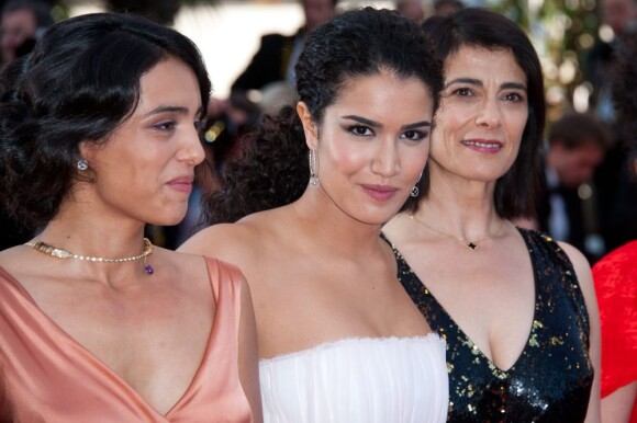 Hafsia Herzi, Sabrina Ouazani et Hiam Abbass lors de la présentation de La Source des femmes au festival de Cannes le 21 mai 2011