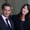 Carla Bruni-Sarkozy et son époux Nicolas Sarkozy à l'Élysée, le 13 mai 2011.