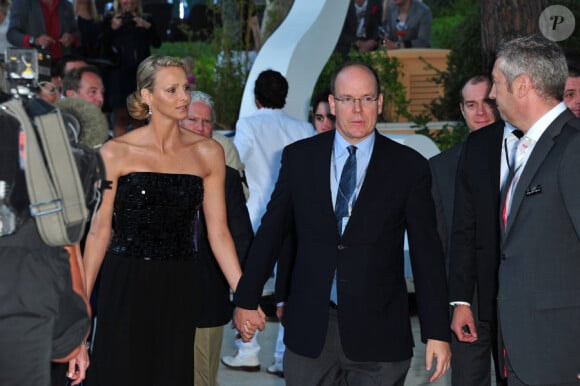 Charlene Wittstock et le prince Albert lors de l'Amber Fashion Show à Monaco le 27 mai 2011