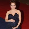 Très enceinte, Alyssa Milano souhaite que ses fans offrent des dons à l'Unicef plutôt que des cadeaux de naissance. Washington, 30 avril 2011