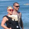 Pink et Carey Hart début juillet 2011, à Malibu, avec leur petite fille Willow.