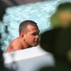 Alex Rodriguez profite de la piscine de son hôtel de Miami, non loin de Cameron Diaz. Août 2011