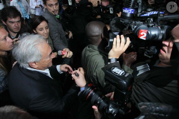 Domnique Strauss-Kahn à son arrivée place des Vosges à Paris, le 4 septembre 2011.
