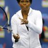Michelle Obama s'est déplacée à Flushing Meadows vendredi 9 septembre 2011 pour le 12e jour de l'US Open. Pas seulement pour être spectatrice, mais aussi pour jouer un match contre Serena Williams et John McEnroe pour promouvoir son programme anti-obésité Let's Move.