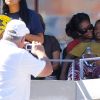 Michelle Obama s'est déplacée à Flushing Meadows vendredi 9 septembre 2011 pour le 12e jour de l'US Open. Elle a suivi la passe d'armes intense entre Andy Murray et John Isner avec sa fille Malia tendrement sur ses genoux.