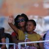 Michelle Obama s'est déplacée à Flushing Meadows vendredi 9 septembre 2011 pour le 12e jour de l'US Open. Elle a suivi la passe d'armes intense entre Andy Murray et John Isner avec sa fille Malia tendrement sur ses genoux.
