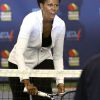 Michelle Obama en tenniswoman pour promouvoir son programme contre l'obésité chez les jeunes Let's Move à Flushing Meadow lors de l'US Open 2011, le 9 septembre.