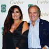 L'acteur Italien Enrico Montesano et sa femme lors de la présentation de la nouvelle collection Sortilège de Cartier à la Villa Aurelia, à Rome le 17 septembre 2011