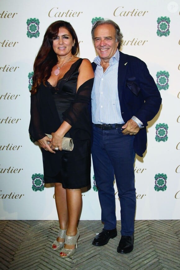 L'acteur Italien Enrico Montesano et sa femme lors de la présentation de la nouvelle collection Sortilège de Cartier à la Villa Aurelia, à Rome le 17 septembre 2011