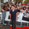 Taylor Lautner arrive à la Fnac des Champs-Elysées (Paris) pour une séance de dédicaces, mardi 27 septembre.