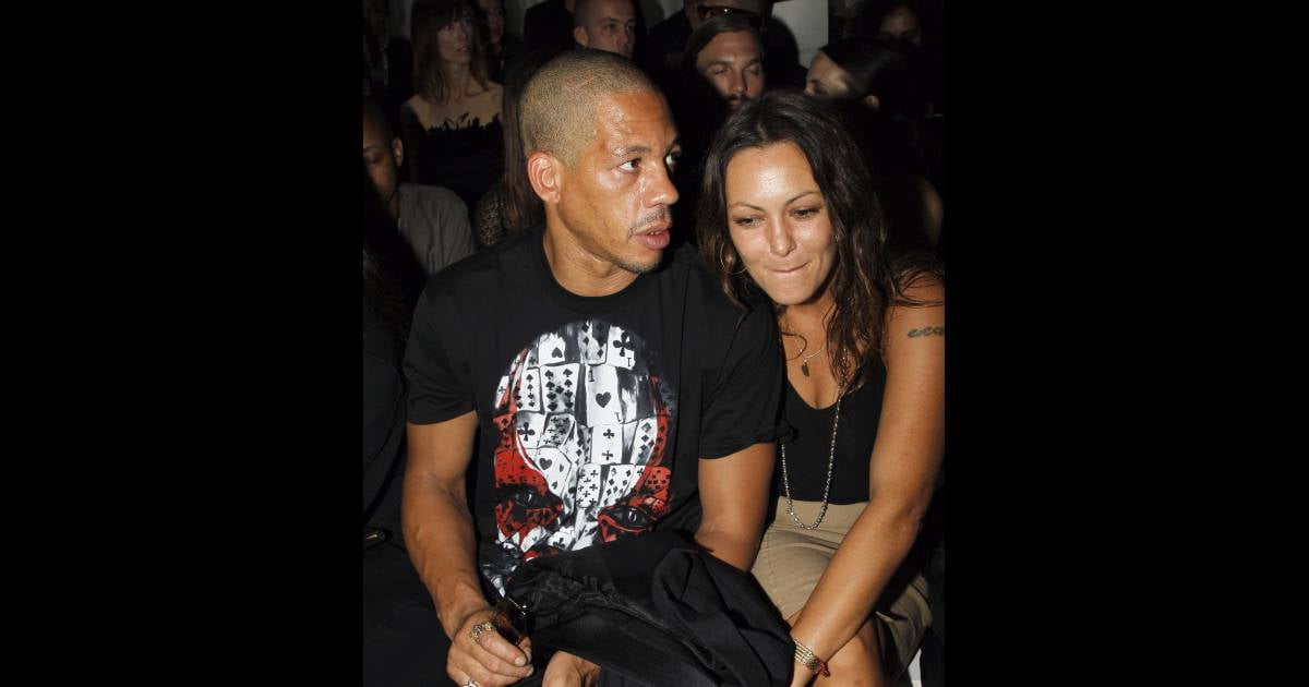 Joey Starr et Karole Rocher au défilé printempsété 2012 de Givenchy lors de la Fashion Week