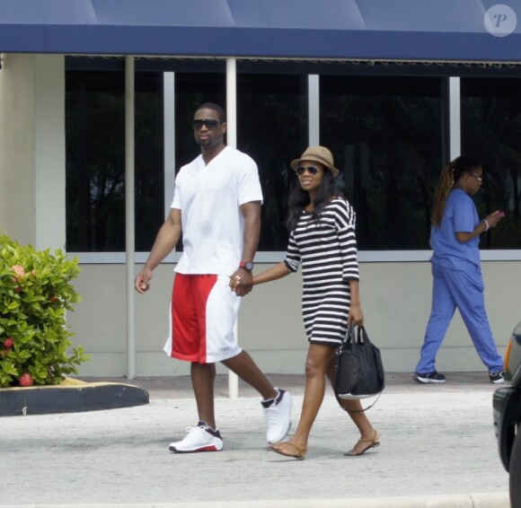 Dwyane Wade et sa compagne Gabrielle Union le 22 septembre 2011 à Miami