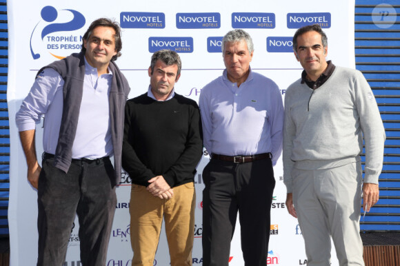 Emmanuel Chain, Rachid Arhab et Christophe Baldelli lors du trophée Novotel des personnalités au golf à Guyancourt le 15 octobre 2011