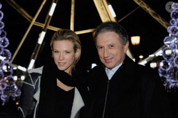 Lorie et Michel Drucker participent aux illuminations de Noël de la Place de la Concorde, à Paris, le vendredi 18 novembre 2011.