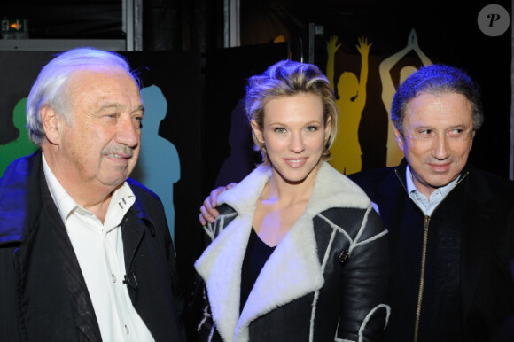 Marcel Campion, Lorie et Michel Drucker déclenchent les illuminations de Noël de la Place de la Concorde, à Paris, le vendredi 18 novembre 2011.