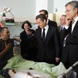 Bernard-Henri Lévy et Nicolas Sarkozy dans un centre médical de Tripoli, en Libye, en septembre 2011. 